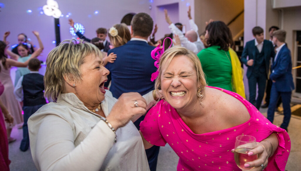Fun and laughter on the dance floor. wedding