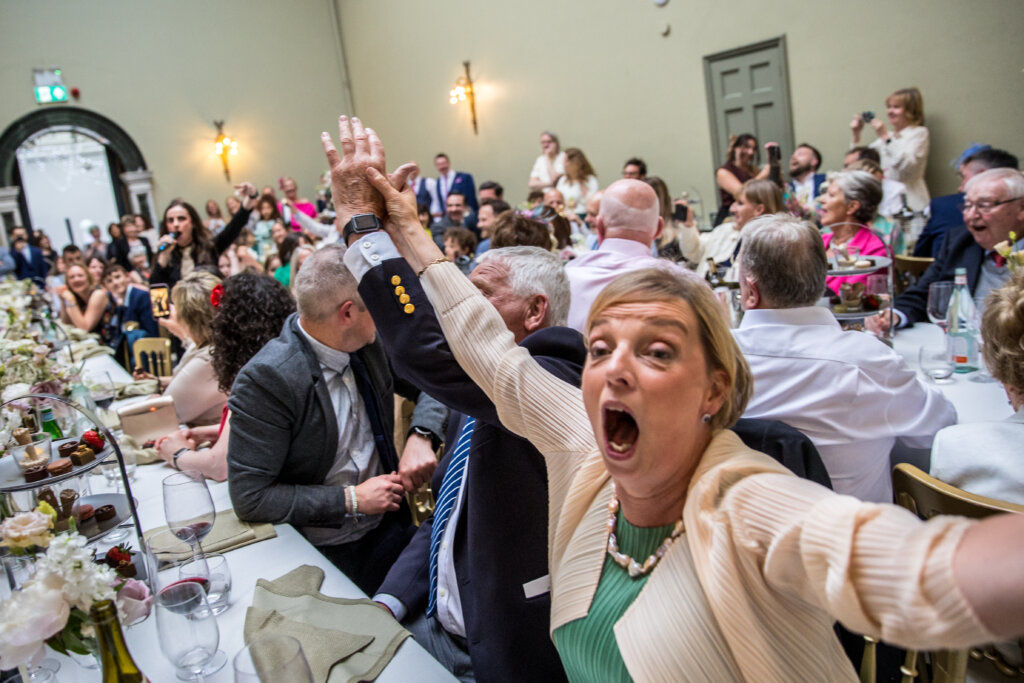 Wedding breakfast fun and laughter.