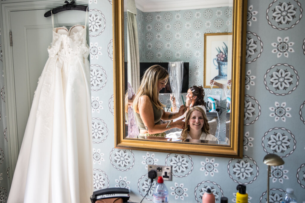 bride, makeup applied, wedding, mirror, makeup artist.