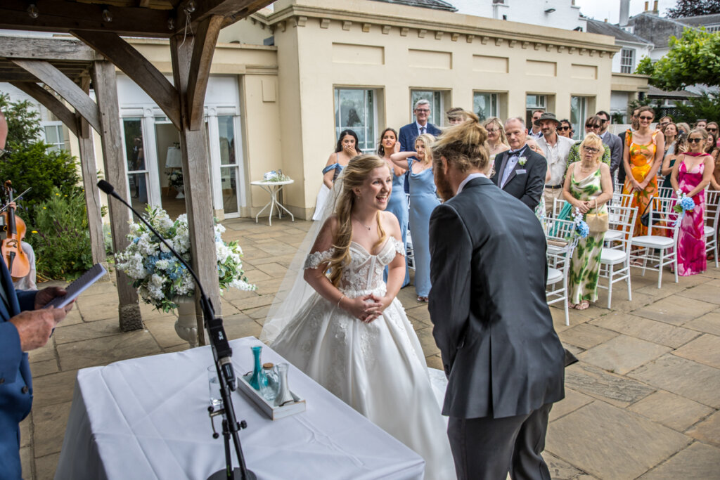wedding ceremony, bride, groom, smiles, happy.