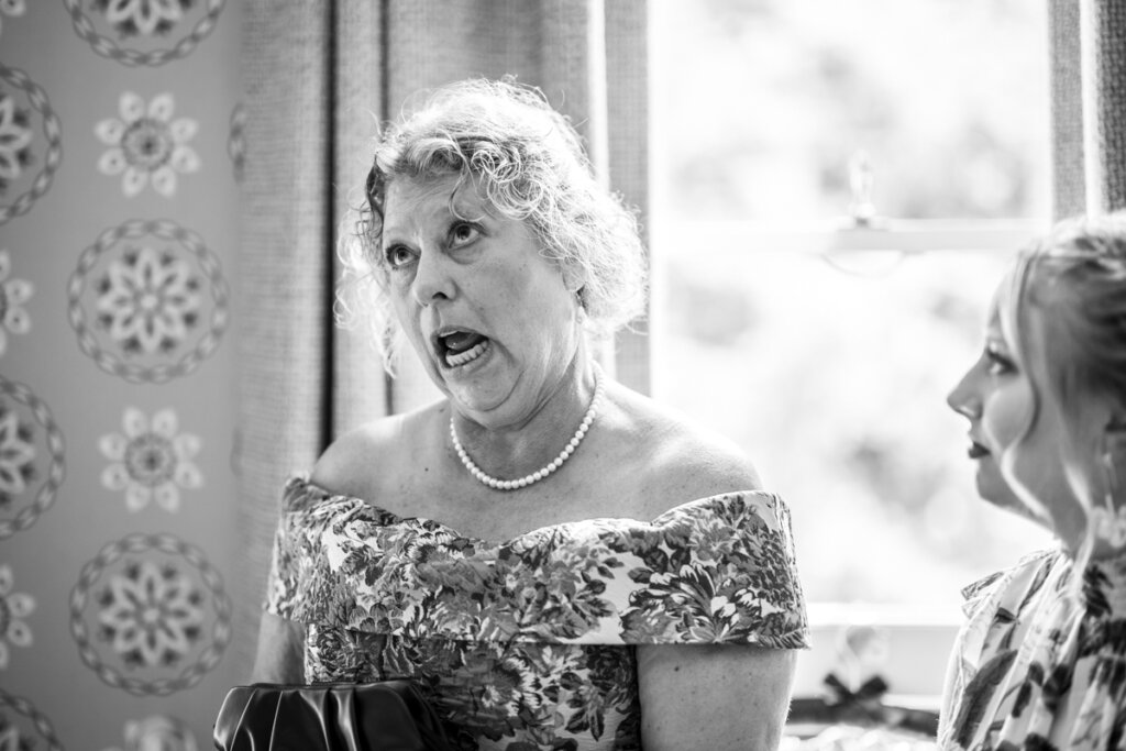 Mother of the groom, off, camera, moment