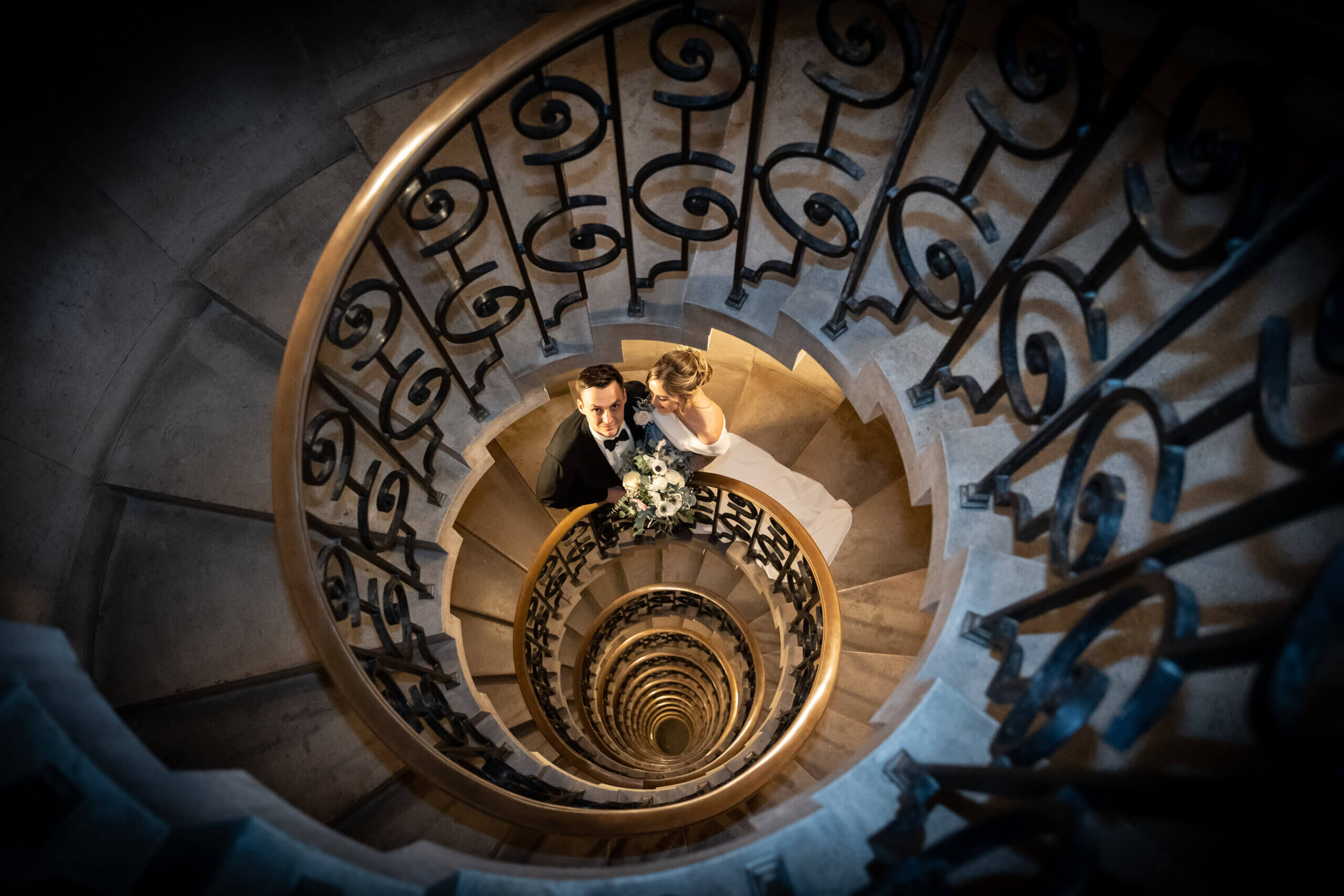 Bride, groom stairs,